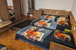 Ein Bett oder Betten in einem Zimmer der Unterkunft Vila Imagina