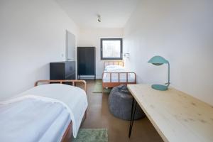 Postel nebo postele na pokoji v ubytování Apartmány Velká Morava