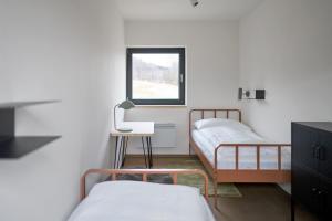 Postel nebo postele na pokoji v ubytování Apartmány Velká Morava