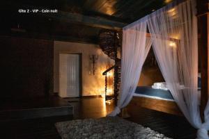Postel nebo postele na pokoji v ubytování Suite Wellness