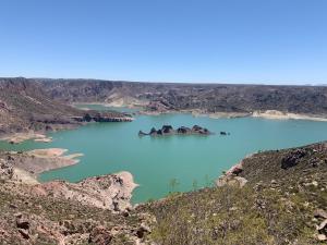 a view of a blue lake in the mountains at Vultur in San Rafael
