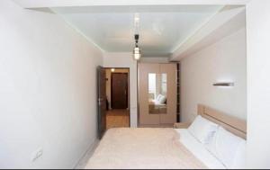 Postel nebo postele na pokoji v ubytování Excellent apartment in the Republic Square Pushkin 3