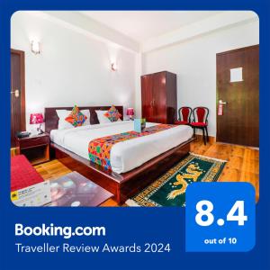 a hotel room with a bed in a room at FabHotel Greenery View Middle Lingding ICAR Road in Gangtok