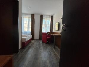 Voodi või voodid majutusasutuse Hotel Fackelmann toas