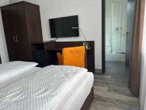 Voodi või voodid majutusasutuse Hotel Fackelmann toas