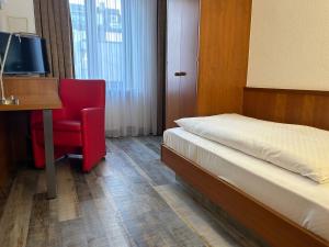Voodi või voodid majutusasutuse Hotel Fackelmann toas