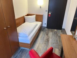 Voodi või voodid majutusasutuse Hotel Fackelmann toas
