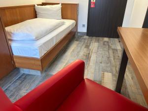 Voodi või voodid majutusasutuse Hotel Fackelmann toas