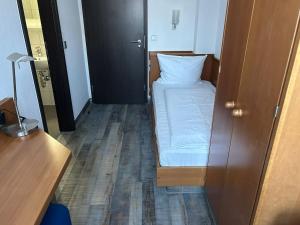 Voodi või voodid majutusasutuse Hotel Fackelmann toas
