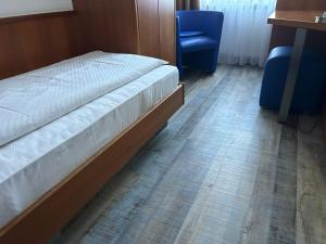 Voodi või voodid majutusasutuse Hotel Fackelmann toas