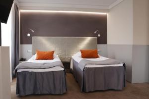 Katil atau katil-katil dalam bilik di Hotel Cristal Park