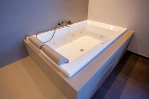 a large bath tub in a room at Park Hotel Bellavista in Gambarie dʼAspromonte