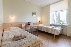 Katil atau katil-katil dalam bilik di Virumaa Hostel