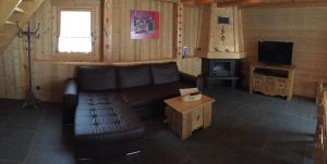 Μια τηλεόραση ή/και κέντρο ψυχαγωγίας στο L'Erine des Alpes SPA Chalet individuel grand confort +20 φωτογραφίες