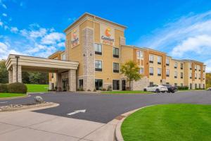 a rendering of a hotel with a parking lot at Comfort Suites Hudson I-94 in Hudson