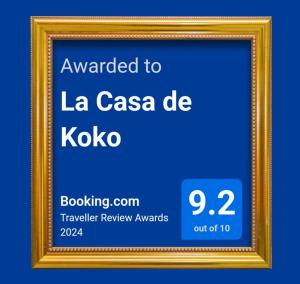 a picture frame with the text awarded to la casa de koya at La Casa de Koko in Las Palmas de Gran Canaria
