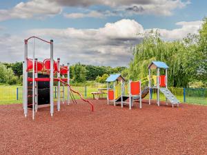 a park with a playground with a slide at 3 Bed in Bridgwater 90939 in North Petherton