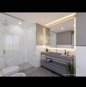 Ett badrum på Adelaide Suite Dreams