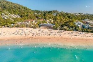 an aerial view of a beach with a bunch of people at The Sanctuary - Family Retreat - Noosa Hinterland in North Arm