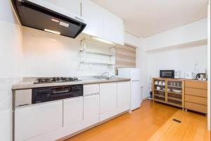 A kitchen or kitchenette at ShibuyaHachiko 6min walk#Easy to many hotspot#Max6