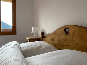 Posteľ alebo postele v izbe v ubytovaní Un séjour plein de charme aux Posses!