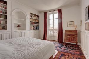 Krevet ili kreveti u jedinici u objektu La chapelle Royale - Versailles