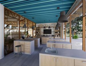 cocina grande con techo azul y TV en Bahia Principe Luxury Esmeralda All Inclusive - Newly Renovated, en Punta Cana