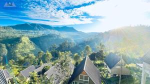 a view of the mountains from a house at Almost Heaven in Talawakele