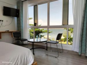 Μια τηλεόραση ή/και κέντρο ψυχαγωγίας στο White Stone Beach Resort