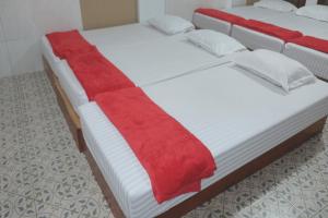 Giường trong phòng chung tại OYO 93595 Puri Adem 86 Syariah Bunkbed