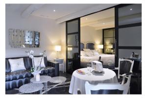 Posezení v ubytování Auberge de Cassagne & Spa