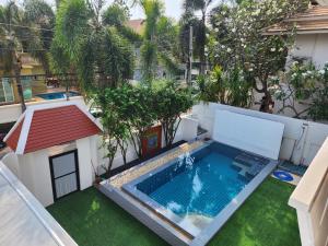 Pattaya'daki 长住优惠房-芭提雅市中心4间卧室泳池别墅好莱坞Hollywood旁 tesisine ait fotoğraf galerisinden bir görsel
