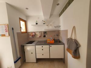 Kuchyň nebo kuchyňský kout v ubytování Maison 2 chambres Olsavinia
