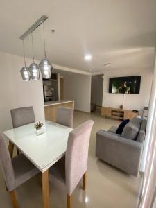 Posezení v ubytování Hermoso, moderno y confortable apartamento.