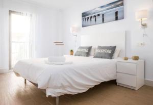 Postel nebo postele na pokoji v ubytování HH Apartamento La Herradura Playa