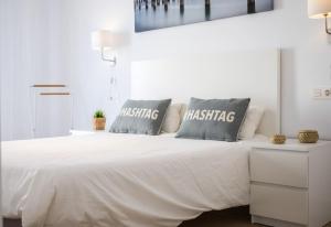 Postel nebo postele na pokoji v ubytování HH Apartamento La Herradura Playa