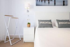 Postel nebo postele na pokoji v ubytování HH Apartamento La Herradura Playa