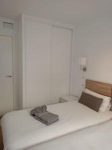 Postel nebo postele na pokoji v ubytování HH Apartamento La Herradura Playa