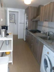Kuchyň nebo kuchyňský kout v ubytování HH Apartamento La Herradura Playa