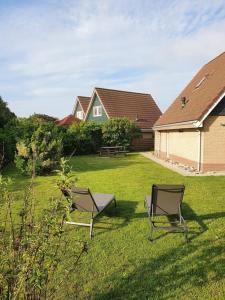 Κήπος έξω από το Prachtig vakantiehuis met afgesloten tuin - 950M van strand Julianadorp +8 φωτογραφίες