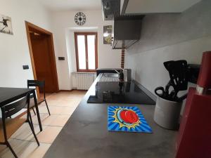 Kuchyňa alebo kuchynka v ubytovaní La Casa dei Bersaglieri