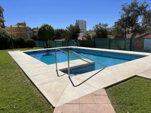 Bazén v ubytovaní Apartamento con jardín privado alebo v jeho blízkosti
