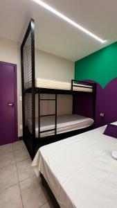 Двуетажно легло или двуетажни легла в стая в Belô Hostel