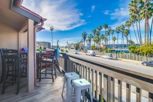 a balcony with a bar and a view of a street at OB Loungin 2 in San Diego