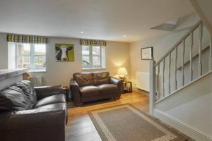 a living room with a couch and a chair at Host & Stay - Himmell in Consett
