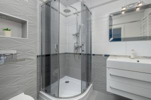 Kúpeľňa v ubytovaní Apartamenty Horyzont SeaView by Rent like home