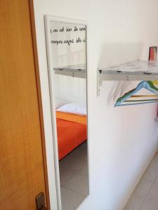 A bed or beds in a room at B&B Porta Nuova