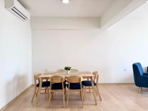 a dining room with a table and chairs at Mutiara Melaka Beach Resort by ISRA in Tangga Batu
