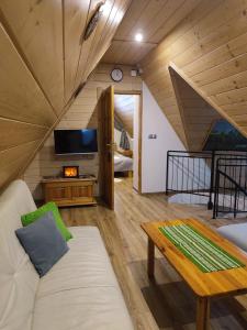 Ένα ή περισσότερα κρεβάτια σε δωμάτιο στο Apartamenty Magiczny Kącik
