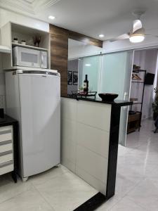 Η κουζίνα ή μικρή κουζίνα στο Pé na areia +13 φωτογραφίες